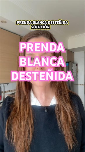 Prenda blanca desteñida solución oí