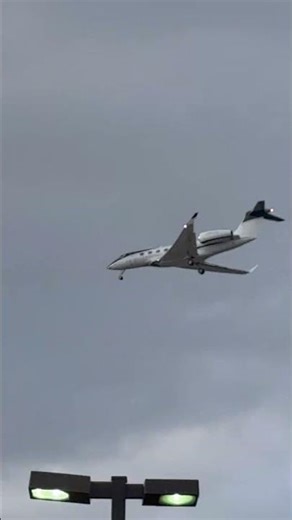 Small Airplane Lands at HOU Hobby Airport, flying over my school.