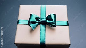 Elegant gift box with a green ribbon and bow, perfect for special occasions and holiday celebrations. Stock Video