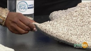 The Empire Man Ryan Salzwedel demonstrates HOME Fresh odor-neutralizing carpet