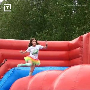 This inflatable obstacle course is the coolest way to run a 5k. | Thrillist Entertainment