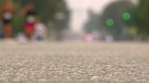 Runners running towards the finish line
