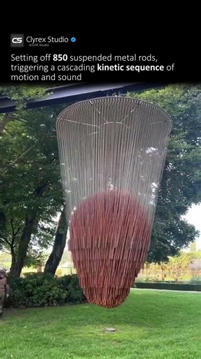 A Cascade of 850 Metal Rods in Motion