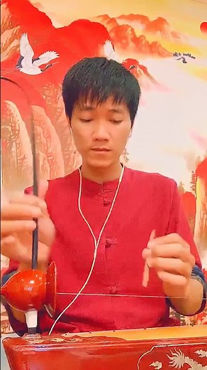 A Chinese artist performs a classic song from Huangmei Opera on the duxianqin, a single-stringed instrument used by the Jing ethnic group in south China. #FunChina #Heritage | China Plus Culture