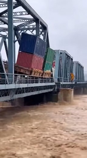 1.4M views · 4.2K reactions | Freight Train Containers Fall from Bridge into Flooded River #fblifestyle | Alone Feel | Facebook