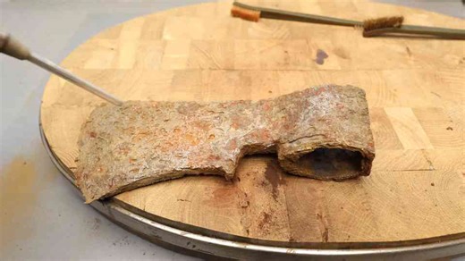 I restored this 17th century axe hidden beneath thick rust