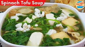 Simple and Soft Spinach Tofu Soup Recipe with Less Oil Spinach Tofu Soup is sweet, tasty and very soft. It's perfect for kids and the elderly. This oil-less soup is very simple to prepare and fast to cook too. Enjoy! Ingredients ↓ Spinach Tofu Soup Recipe Ingredients: 200g of baby spinach, washed, cut, and separated the stems and the leaves 1 liter of water 55g of fuchok or fried beancurd sheets 6 pieces of seafood tofu 280g of squid, optional 270g of silken tofu 1 tbsp of cut spring onion 2 tbs