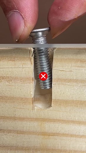 Hot glue trick to secure a wall-embedded nut. | glue