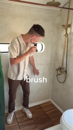 Have you ever seen an RV with a better shower than this? DIY tropical concrete shower walls in our skoolie #skoolieconversion #skoolie #buslife #buslover #shower #bathroommakeover #bathroomremodel