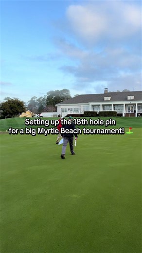 Setting Up Pins for the World Junior Golf Tournament