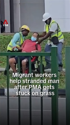 Migrant workers help stranded man after PMA gets stuck on grass