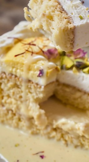 Get ready to experience dessert perfection with our incredible Rasmalai Tres Leches Cake. This recipe combines the best of Indian and Latin American flavors into one moist, tender, and absolutely delectable cake, all without a single egg! Full Recipe Ingredients: 1 cup regular homemade curd • 1/2 tsp baking soda • Superfine sugar (adjust to taste) • Vegetable oil (adjust to taste) • A splash of vanilla extract • All-purpose flour (maida, adjust to taste) • 1 tsp baking powder • 1 1/2 cups warm m