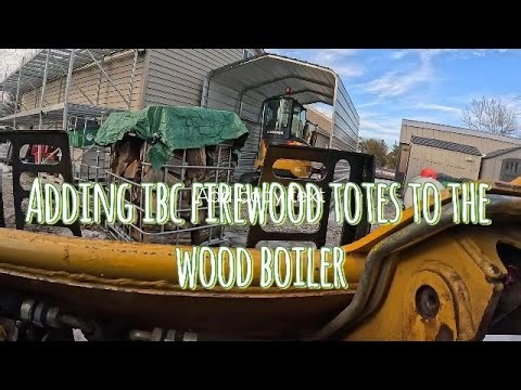 IBC totes of Firewood - Boiler wood reload with CAT skidsteer loader