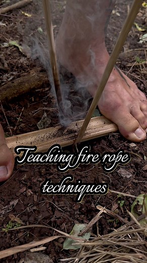 Teaching fire rope techniques #firethong #primitivefirelighting #outdoors #survival #selfsufficiency #bushcraft #survivalfire #knowledge | dalemgumino