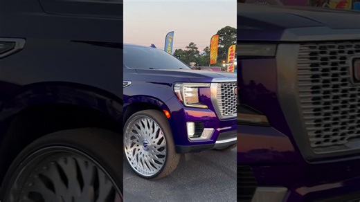 Candy purple GMC Yukon on 30’s