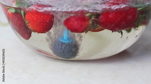 Processing fruit with ozone. Ozonation of vegetables, fruits and meat to destroy viruses, bacteria and pesticides. Vegetables in the water into which ozone is injected for disinfection