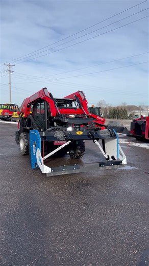 SnowFire BLAST Pusher with Back Drag Kit on Manitou 2750 V Skid Steer