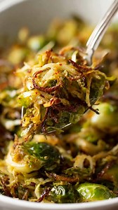 Brussels sprouts shredded fine. Toss with bacon grease, garlic salt, red pepper flakes. Sauté 10 minutes until lightly browned and tender. Finish with parmesan for a savory, crispy-edged, cheesy bite—low carb comfort at its best. Ingredients ➤ 1½ pounds Brussels sprouts, shredded ➤ 1 cup grated parmesan cheese ➤ 2 Tbsp bacon grease FULLL Recipe in First Cօʍʍеոτ 👇👇 | Nessy Recipes