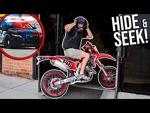 HIDING FROM THE COPS IN DEALERSHIP!