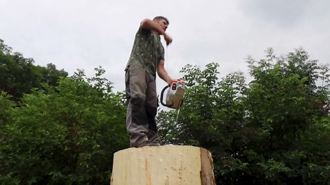 Life-Size Wooden Wolf Crafted With Chainsaw