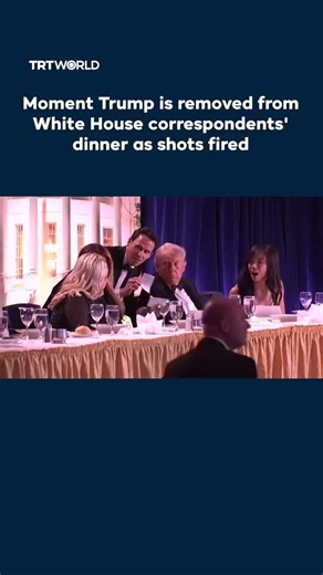 Trump evacuated from press dinner as 'loud bangs' spark security alert