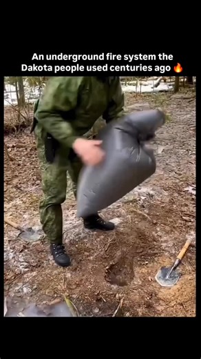 nyc boy on Instagram: "The Dakota fire hole was an underground fire system once used by Dakota people to produce steady heat with very little smoke. Two small pits were dug and connected by a short tunnel. One pit fed oxygen directly to the base of the fire, improving combustion and raising temperature, while the fire itself stayed below ground, shielded from wind. This design kept flames low, reduced light and smoke, and used minimal fuel. The surrounding soil helped regulate airflow and heat, 