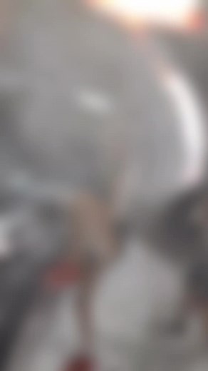 Exciting Car Wash Scene with Fun Water Spray