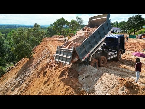 Amazing! Be Careful! 15T Trucks Unloading Big Stone on the Mountian & D37E Dozer Pushing Stone