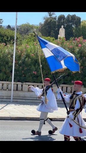 Changing of Guard Ceremony, Athens, Greece 🇬🇷 The Grand Changing of the Guard ceremony in Athens takes place every Sunday at 11:00 AM at the Tomb of the Unknown Soldier in Syntagma Square, featuring a full parade by the Evzones Presidential Guard with a military band and the guards' full ceremonial uniforms. Arrive at least 45 minutes early for a good view, as the parade can start around 10:00 AM. The costumes are traditional military uniforms. The colours and designs of the uniforms symbolise