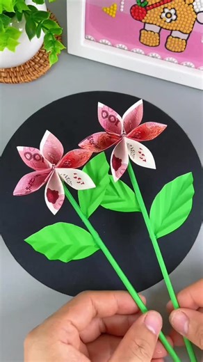 paper crafts creator | Step-by-Step Origami Money Flower Tutorial #OrigamiMoneyFlower #MoneyFlowerDIY #CreativeOrigami #HandmadeCraft #EasyOrigami #DIYProject... | Instagram