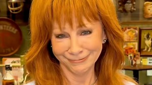 Country music star Reba McEntire calls out AI video of her at Dolly Parton's 'deathbed'