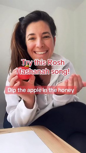 🍎 🍯 Raise your hand if you’re excited for Rosh Hashanah! Try this song with your kids for a fun way to learn about a traditional Jewish new year treat! Share this with a friend and follow for more Jewish joy at home! 💙 #Roshhashanah #Jewish #Jewishnewyear #jewishsingalongs #Judaism #applesandhoney #roshhashanahsongs #hebrewschool #jewishholiday | Sing it with Ms. Sara