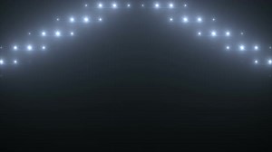 Bright stage lights flashing. White flashing lights wall