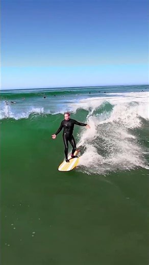 Yellow White board on a good ride out in Encinitas, Ca 02/08/26