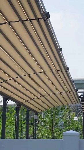 Make use of outdoor space by setting up a retractable canopy, providing shade and protection from rain. #pergola #outdoors #garden #backyard #newtrend #design #electric #outdoor #fypシ #fyp #gardendesign #gardenfurniture #outdoorfurniture #backyarddecor #backyarddesign #patiocover #pergoladesign #patiodecor #patiodesign #backyardideas #outdoorlivingspace