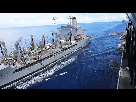 US Navy Ships Conduct Replenishment at Sea