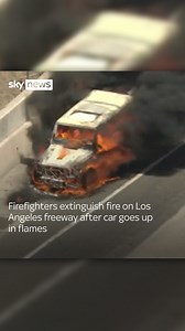 Firefighters extinguish fire on Los Angeles freeway after car goes up in flames. #fire #car #california | Sky News