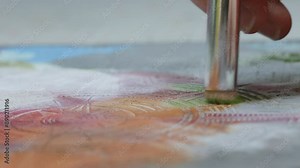 Flat Paint Brush Using Small Stroke in Drybrushing Technique on Texture Palette Getting Ready to Apply on Miniature Model