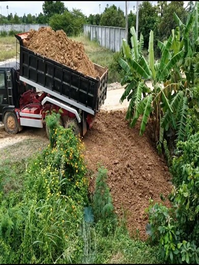 Risky Business: Pushing Trucks into Water to Build a Foundation. | Dozer Tv