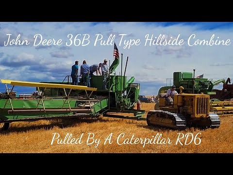 John Deere 36B Pull Type Combine Pulled By A Caterpillar RD6