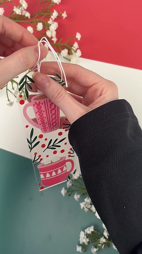 3.1K views · 23 reactions |  Make reading cozy and #aesthetic with this bookmark idea! ✂️ Materials - • Acrylic Bookmark Rectangle - 6" x 2" x 0.06" • Holiday Cozy Cocoa UV DTF • Jade Thread - White • Silicone Focal Bead Peppermint Swirl - Red • Keychain Tassel Gold Ring - Red  Shop project materials at diycraftwarehouse.com #bookmarks #bookish #books #tutorial #diycrafts | DIY Craft Warehouse | Facebook