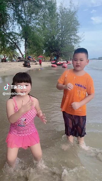 Fun Day at the Beach with Children Playing