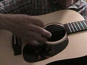 Martin DXMAE acoustic guitar.