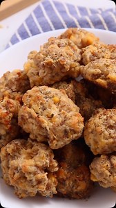 4 Ingredient Sausage Balls! 🔥🙌 These are always a fan favorite that disappear FAST! Ingredients ▢ 2 cups Bisquick ▢ 4 cups cheddar cheese ▢ 1 pound sausage spicy ▢ 1/4 cup milk Instructions 1. Mix together all the ingredients in a large bowl - Bisquick, cheddar cheese, sausage, & milk 2. Form into balls using hands or a small scoop 3. Place 2” apart on a baking sheet lined with parchment paper 4. Bake in the oven at 350 degrees for 20-25 minutes or until lightly brown #sausageballs #appetizer 