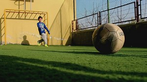 Two children playing soccer shootouts - Free Stock Video