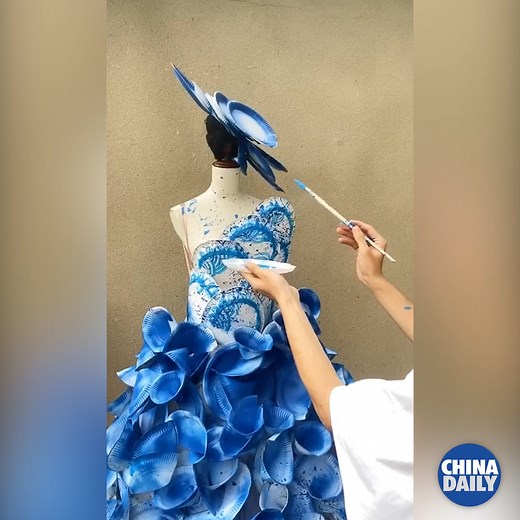 38K views · 734 reactions | #ChinaStory What happens when you give a fashion designer ordinary paper plates? A high-styled haute couture dress! | China Daily | Facebook