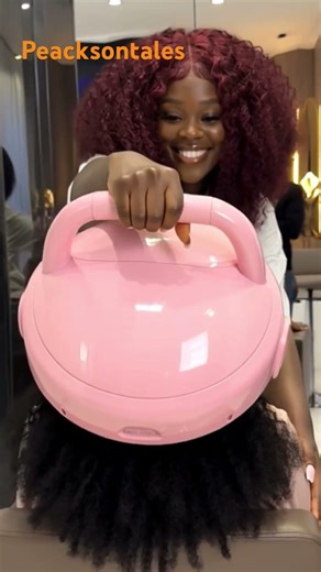 Futuristic Cornrow Braiding Machine Creating High Ponytail Patterned Braids