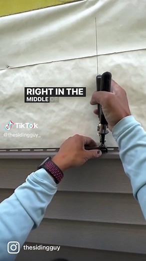 I’ve shown a nail slot punch before in another video quite a long time ago. This is a tool I haven’t seen many siding installers use. This is what it was designed for. Many local installers tell me they just angle the nail or staple. If you’ve ever tried that, then you’ll know that the angled nail head can show through in the next course of siding as one part of the nail head sits too proud. Also, if you get too close to the edge of the nailing slot while angling nails, you run the risk of “trap