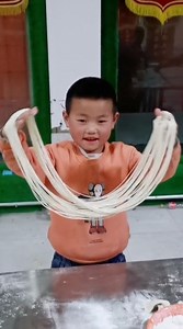 264K views · 827 reactions | A little boy became a noodle-making master at a very young age! He has invested time and energy in learning to stretch noodles, which is the traditional way to make this dish. The Lanzhou noodle is a well-known delicacy of chewy noodles and delicious beef soup. #Spring #Talent | China Plus Culture | Facebook