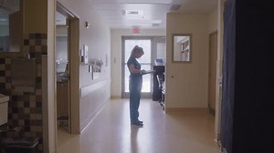 Doctor Checking Notes On Her Notepad